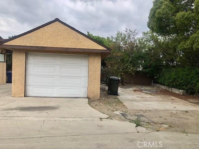 garage with driveway