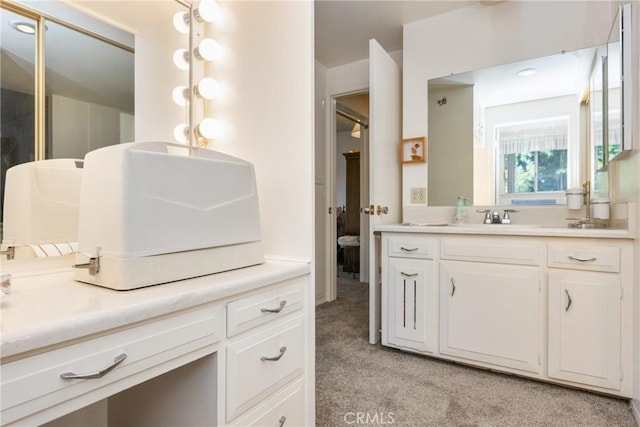 full bath with vanity and ensuite bathroom