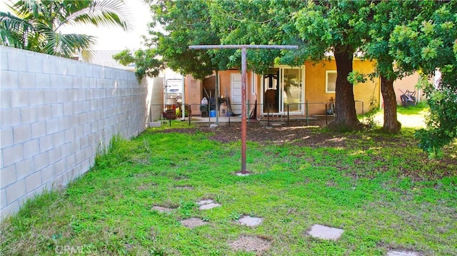 view of yard featuring fence