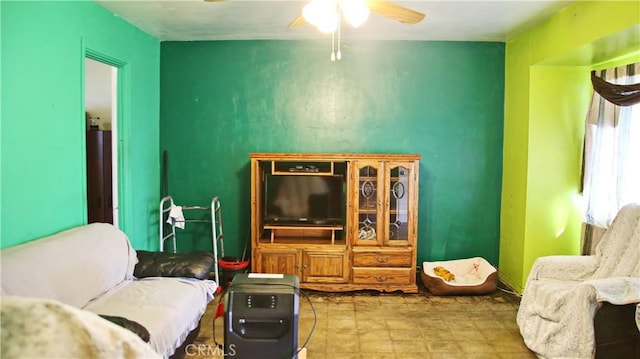 living room with ceiling fan