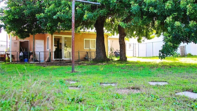 view of yard featuring fence