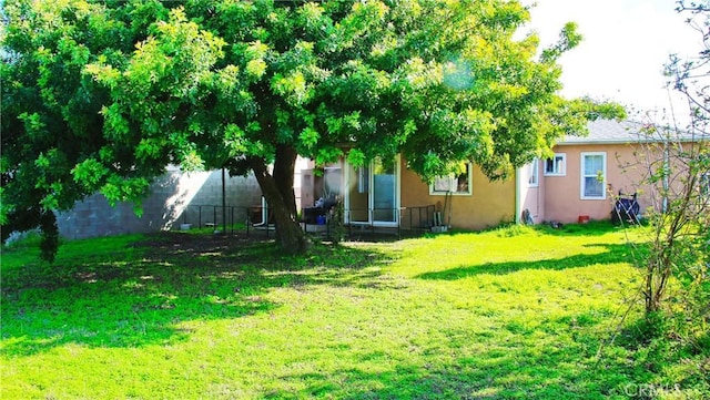 view of yard with fence