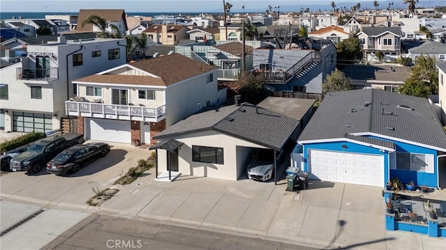 birds eye view of property with a residential view