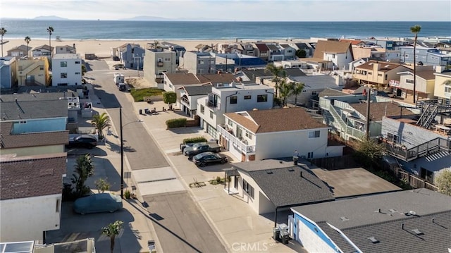 aerial view featuring a water view and a residential view