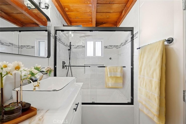 full bath with wooden ceiling, combined bath / shower with glass door, vanity, and beam ceiling