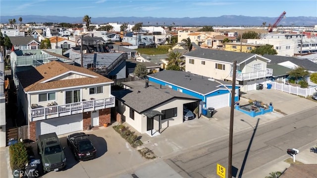 birds eye view of property featuring a residential view and a mountain view