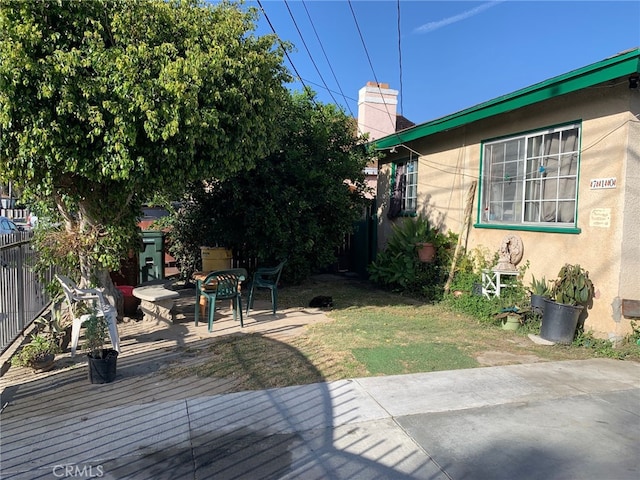 exterior space with a patio area and fence