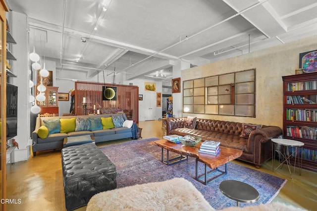 living room with finished concrete flooring