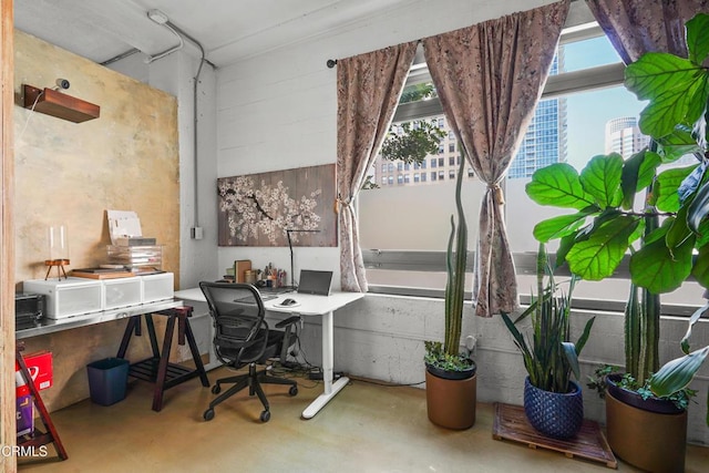 office area featuring finished concrete floors