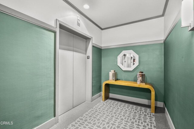 849 S Broadway Unit M11, Los Angeles, CA 90014 - corridor featuring elevator and baseboards