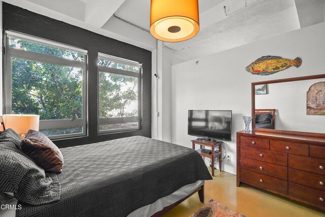 849 S Broadway Unit M11, Los Angeles, CA 90014 - bedroom featuring beam ceiling