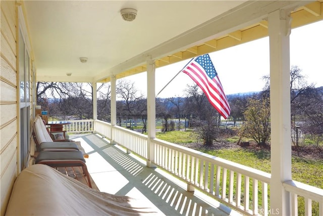 deck featuring covered porch