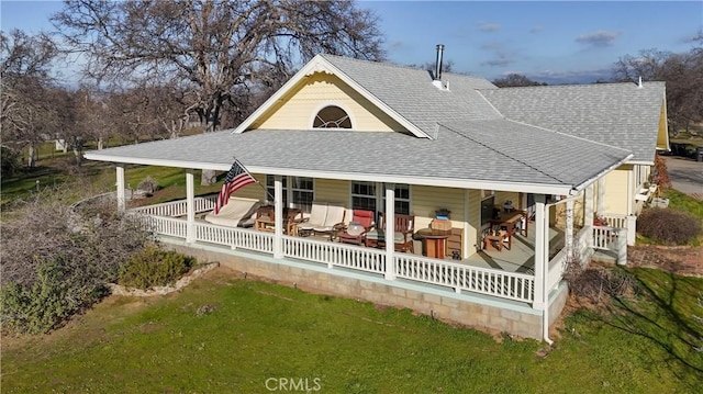 exterior space featuring roof with shingles and a lawn