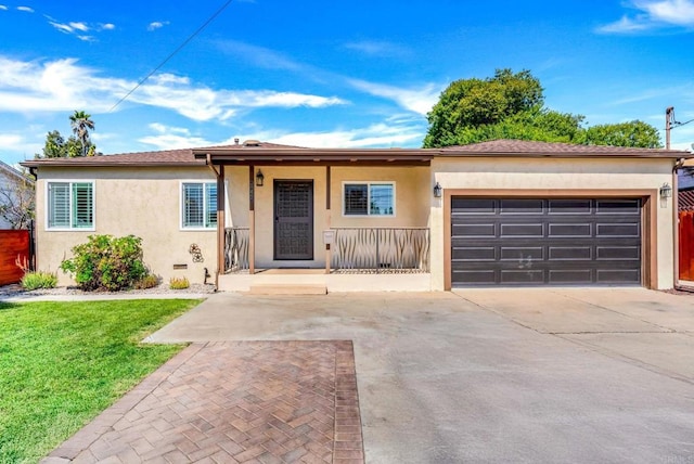 ranch-style house featuring stucco siding, a front lawn, concrete driveway, and an attached garage