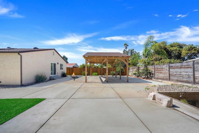 view of patio / terrace featuring a gazebo and a fenced backyard