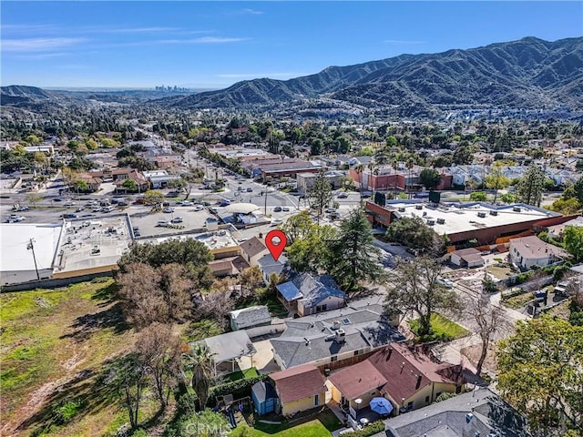 bird's eye view with a residential view and a mountain view