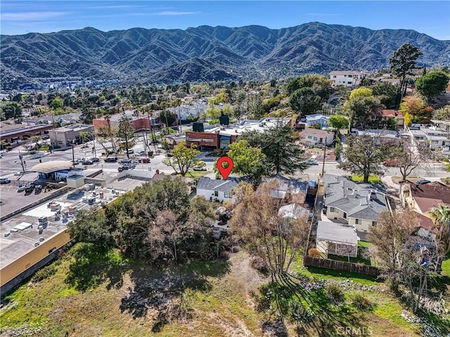 birds eye view of property featuring a residential view and a mountain view