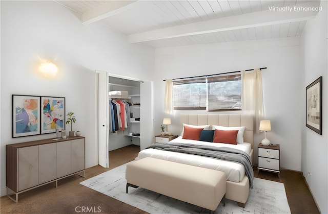 bedroom with a closet, wood ceiling, vaulted ceiling with beams, and a walk in closet