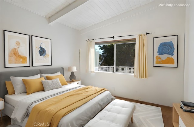 bedroom with wood ceiling and vaulted ceiling with beams