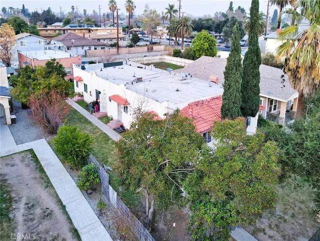 birds eye view of property with a residential view