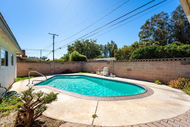 view of swimming pool with a patio, a fenced backyard, and a fenced in pool