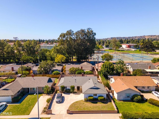 birds eye view of property with a residential view