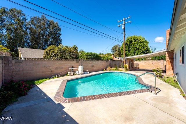 view of pool with a fenced in pool, a patio area, and a fenced backyard