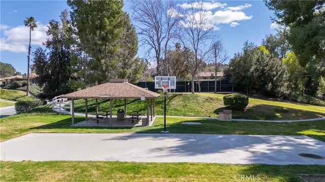 view of home's community with a gazebo and a yard