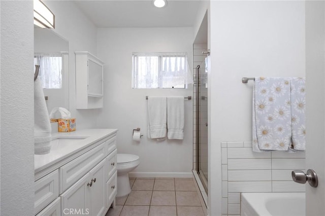 full bathroom featuring tiled shower, toilet, tile patterned flooring, a bathtub, and vanity