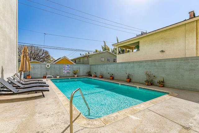 334 Gladys Ave Unit 103, Long Beach, CA 90814 - pool with a fenced backyard and a patio area
