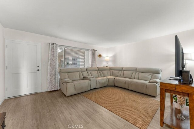 334 Gladys Ave Unit 103, Long Beach, CA 90814 - living room featuring light wood-type flooring