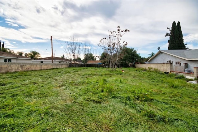 view of yard with fence