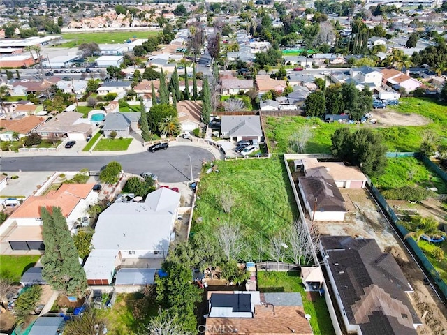 birds eye view of property with a residential view