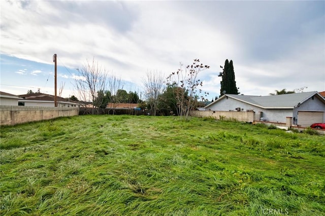 view of yard featuring fence