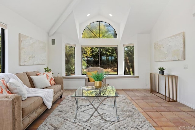 sunroom / solarium featuring vaulted ceiling