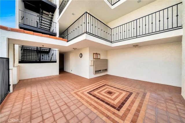 view of patio with a balcony