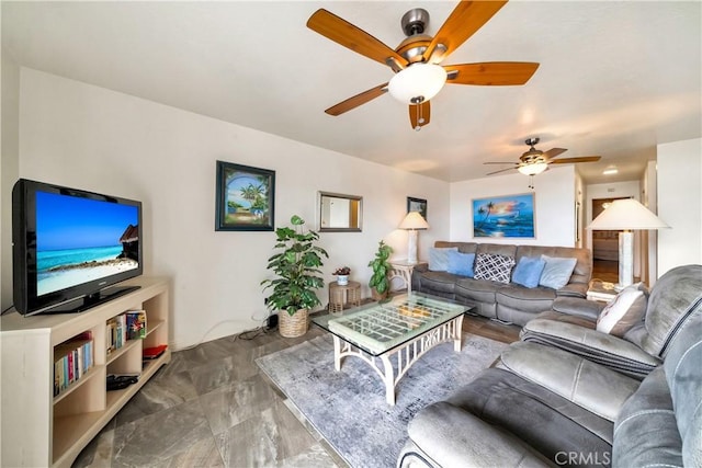 living area with ceiling fan
