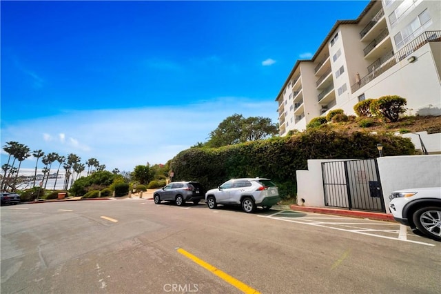 411 Avenida Granada Unit 2B, San Clemente, CA 92672 - view of property with uncovered parking