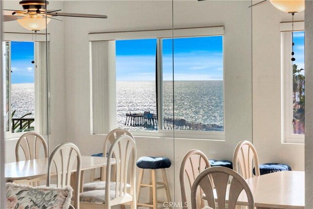 411 Avenida Granada Unit 2B, San Clemente, CA 92672 - dining area with a water view and ceiling fan