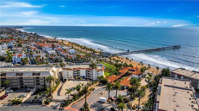 aerial view with a beach view and a water view