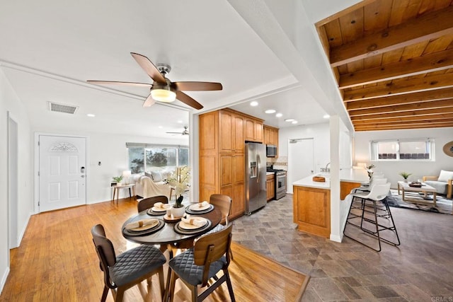 dining space with wooden ceiling, visible vents, beam ceiling, and recessed lighting