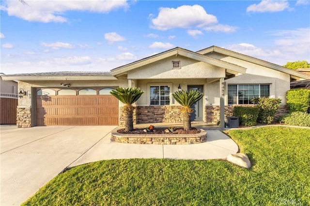 ranch-style house featuring an attached garage, stone siding, concrete driveway, and stucco siding