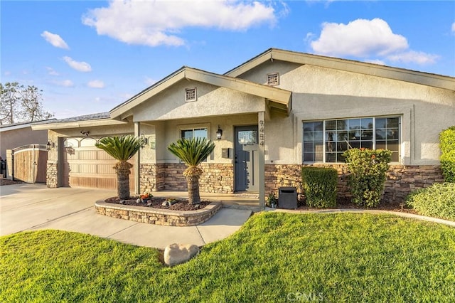 single story home with a garage, stone siding, concrete driveway, stucco siding, and a front yard