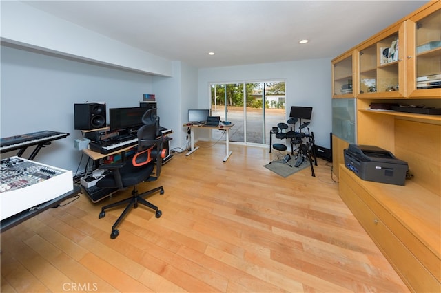 office area with light wood-style flooring and recessed lighting