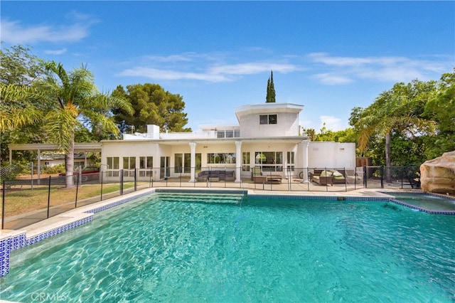 view of swimming pool with a fenced in pool, a patio area, and fence