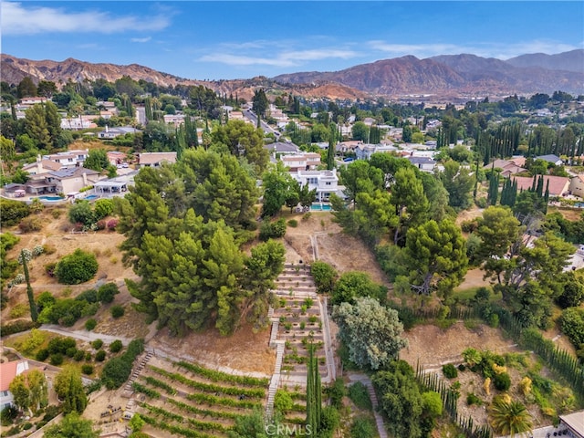 drone / aerial view featuring a mountain view