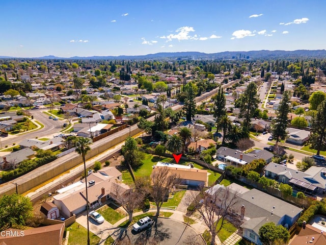 aerial view featuring a residential view and a mountain view