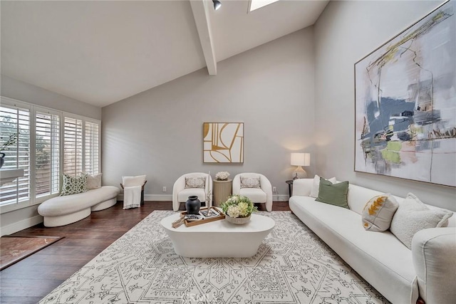 living room featuring high vaulted ceiling, beam ceiling, baseboards, and wood finished floors