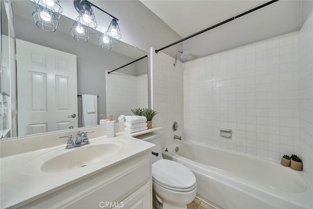 full bathroom with toilet, tile patterned flooring, vanity, and bathing tub / shower combination