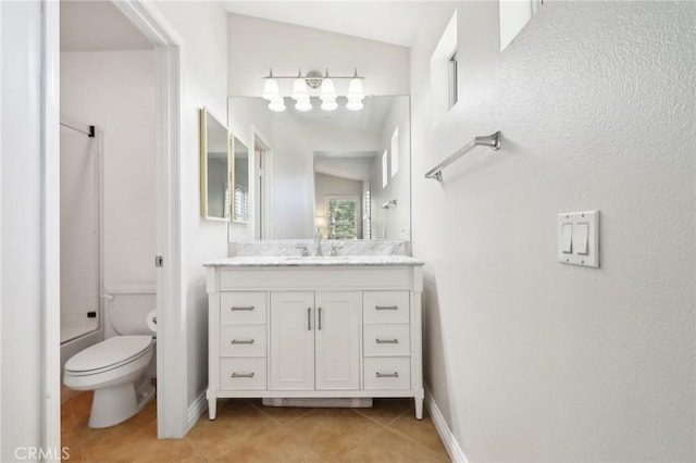 bathroom with baseboards, bathing tub / shower combination, toilet, tile patterned floors, and vanity